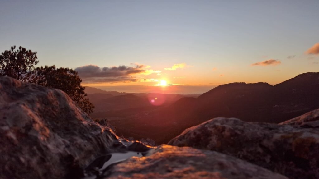 Sunrise seen from the rocks above Xorret de Catí, with the valley still in shadow